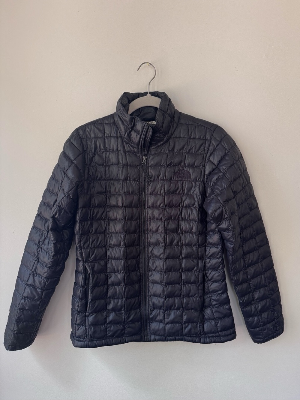 North Face black quilted jacket, size small